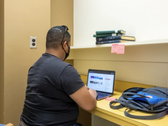 Student studying in a study desk