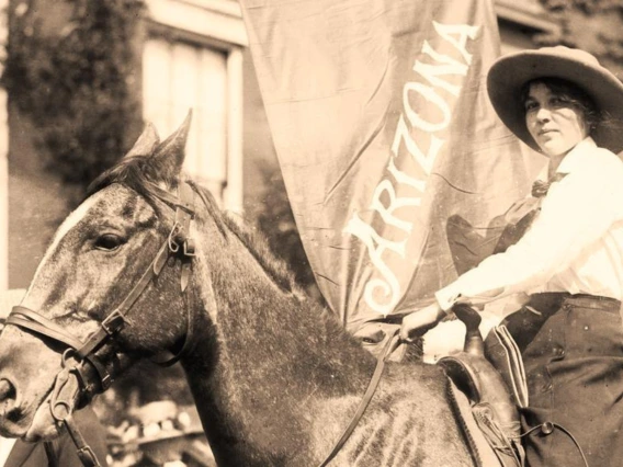 A woman rides a horse in undated photo