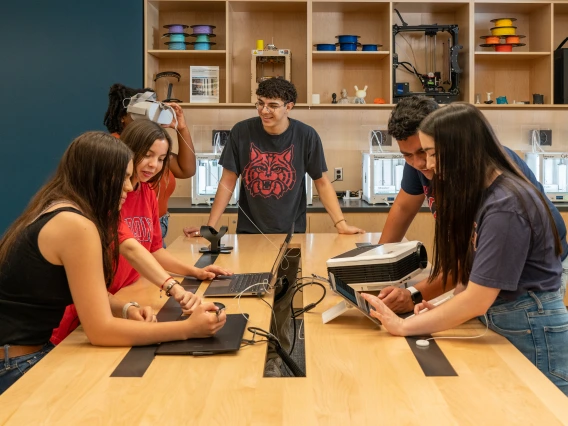 students at tech toolshed looking at equipment