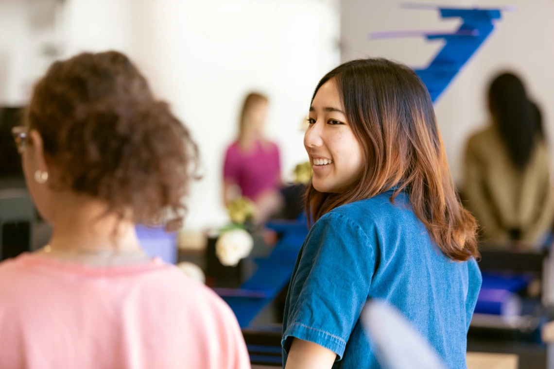 two students sitting next to each other