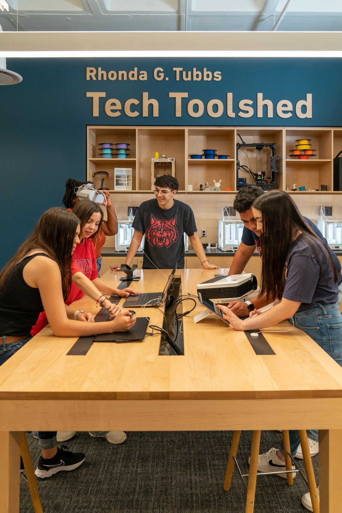 students at tech toolshed looking at equipment