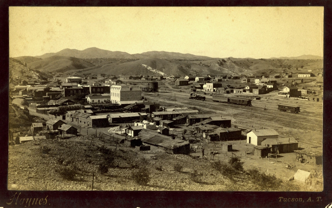 Sepia toned photo of Nogales, Arizona and Nogales, Mexico