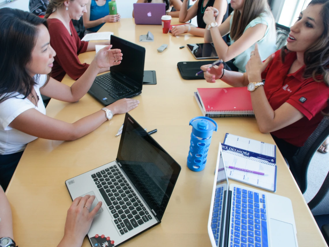 Women in a meeting discussing ideas