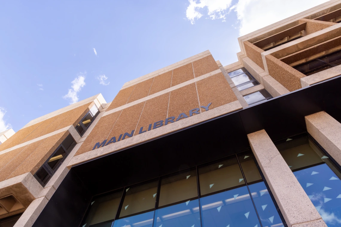 main library sign on building entrance