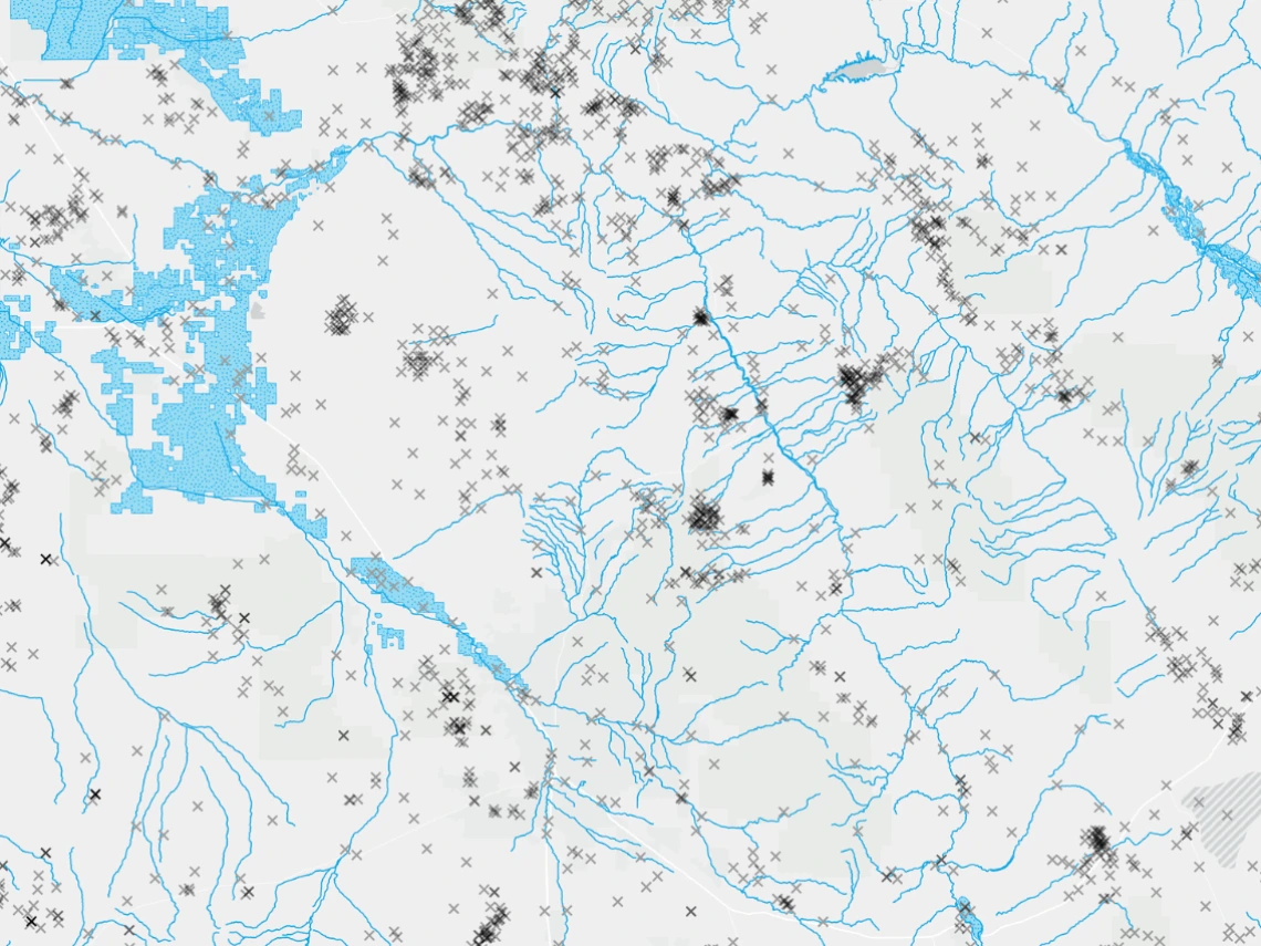 Map containing data downloaded from GeoBlacklight Geospatial Portal including locations of mines, irrigation districts, and streams and rivers.
