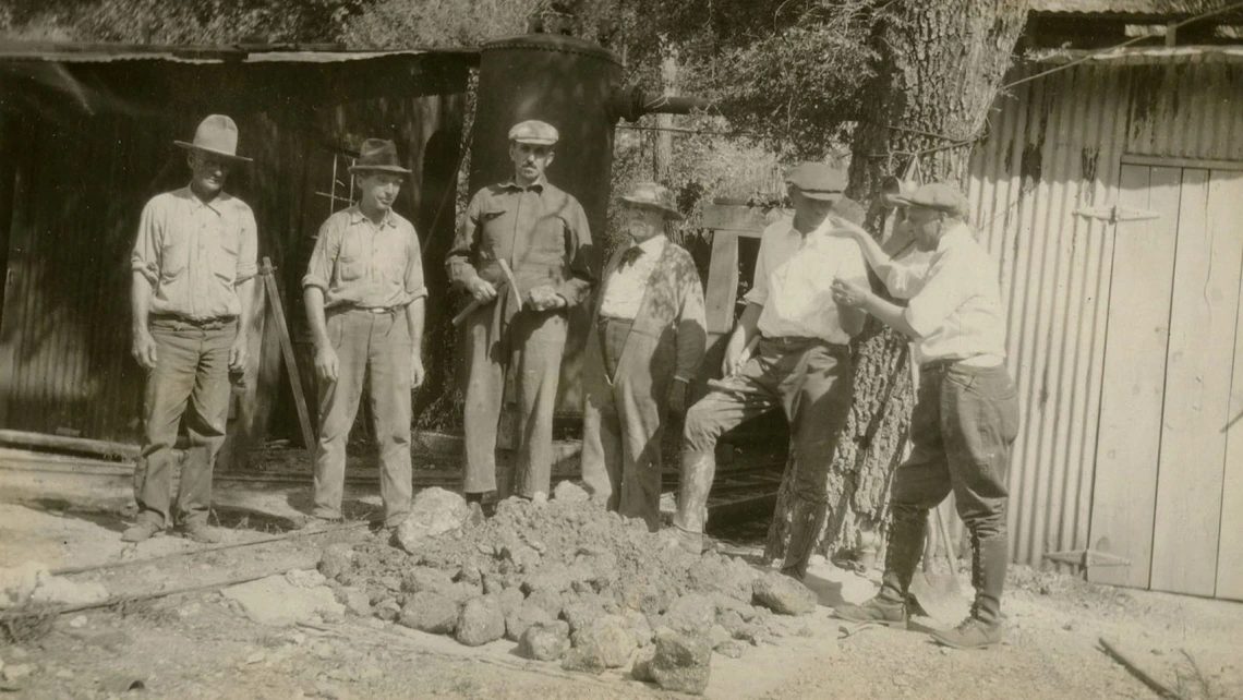 Photograph from Morning Glory Mine of Miners Surrounding Ore, circa 1920-1932