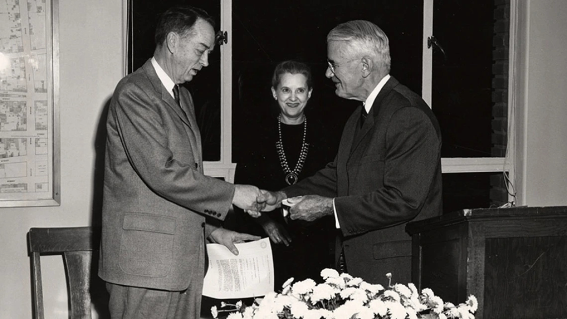 Photograph of Dr. Rudolph H. Gjelsness Receiving Medal of Merit, 1960