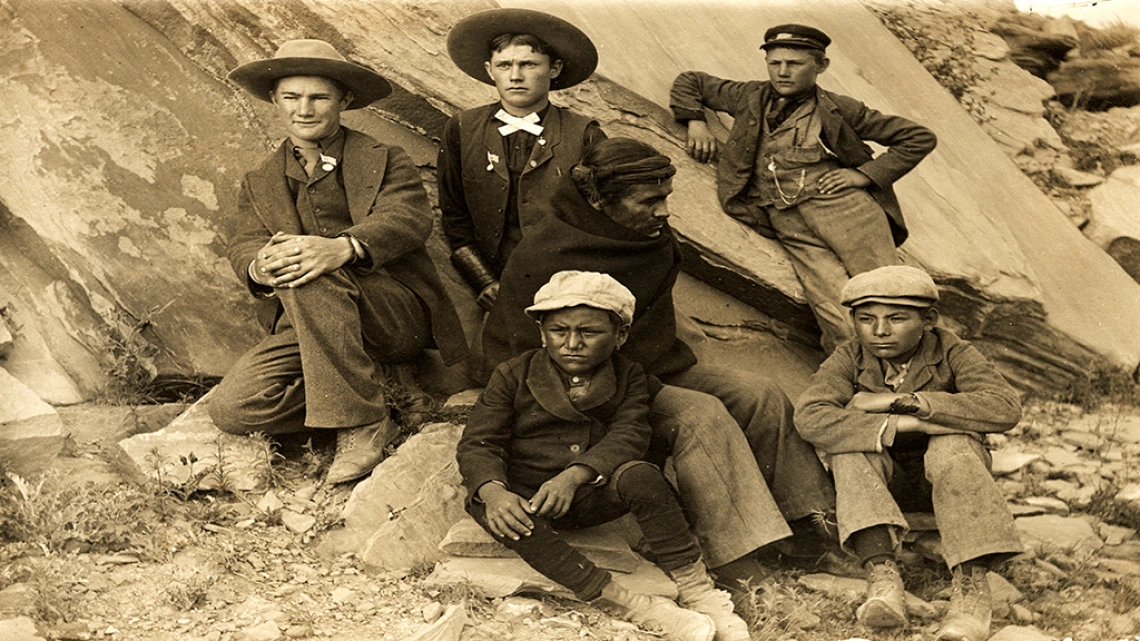 Photograph of Native American Man encircled by Five Boys, undated Photograph of Native American Man Encircled by Five Boys, undated