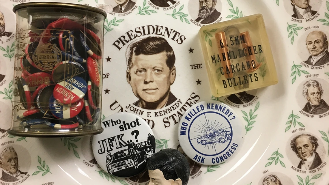 Commemorative John F. Kennedy plate, buttons, bullets and doll head, 1960s, undated