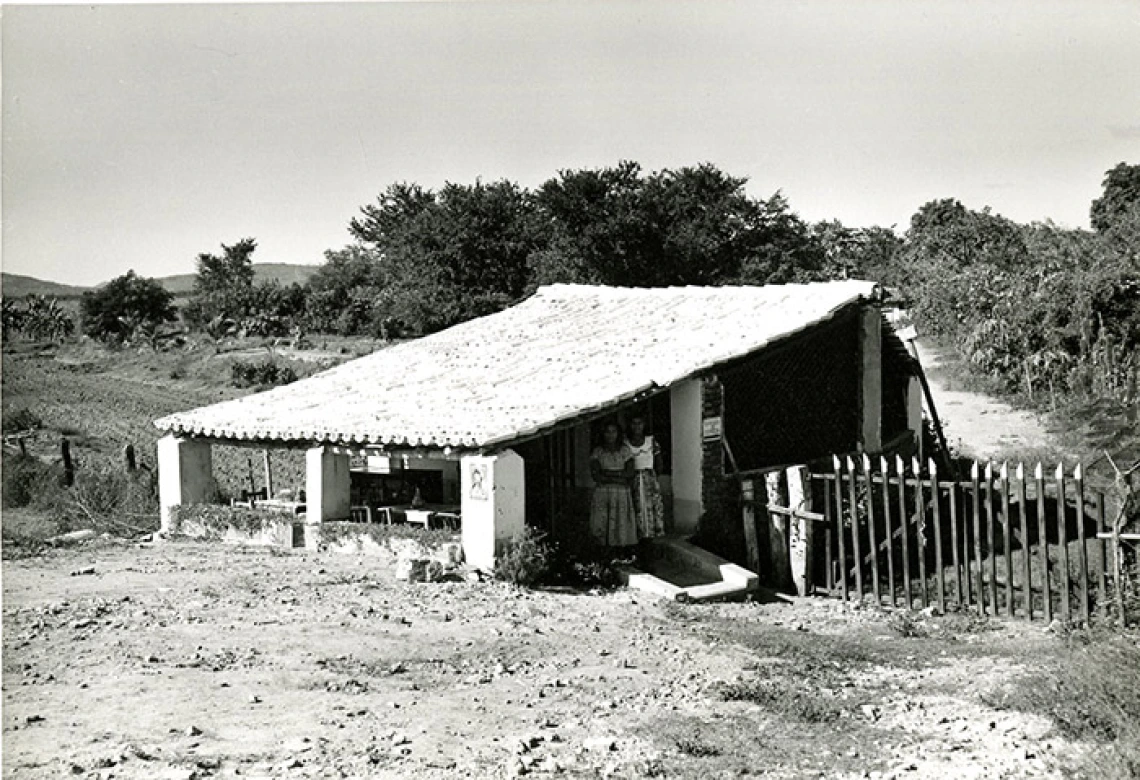 Two women in a small house