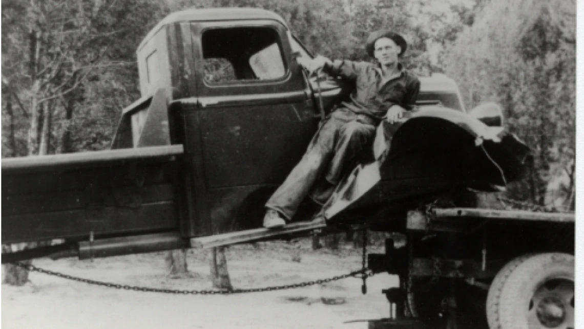 Unidentified Man Posing on Truck, undated