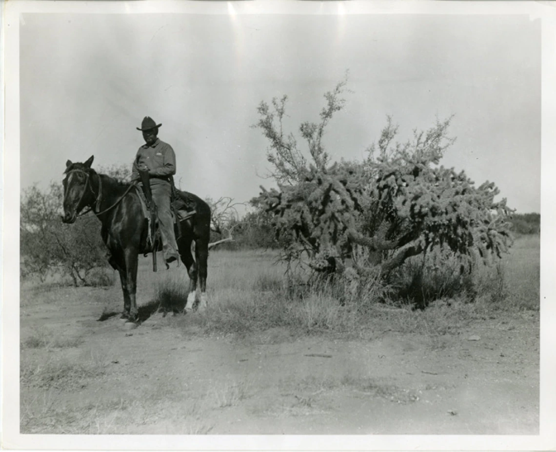 W.J. McGee on Horesback in the Desert