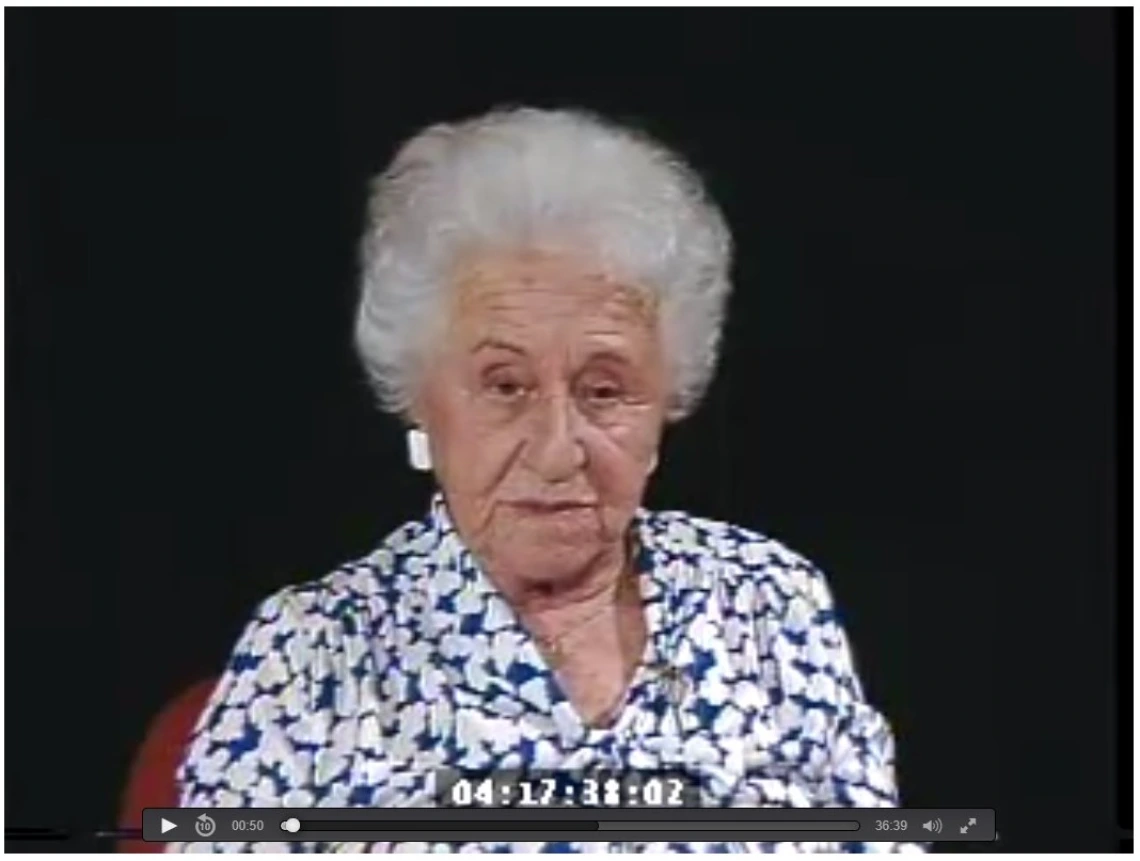 Still image from the Holocaust testimony of Erna S. from the Jewish Federation of Southern Arizona Holocaust testimony videocassettes, 1989.