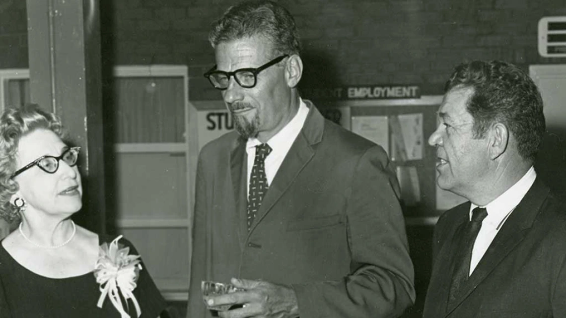 Richard Wormser standing with two unknown people