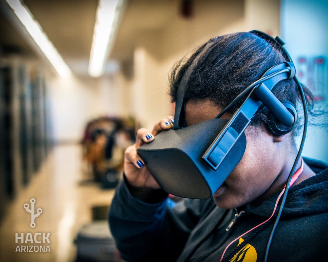 student wearing virtual reality goggles