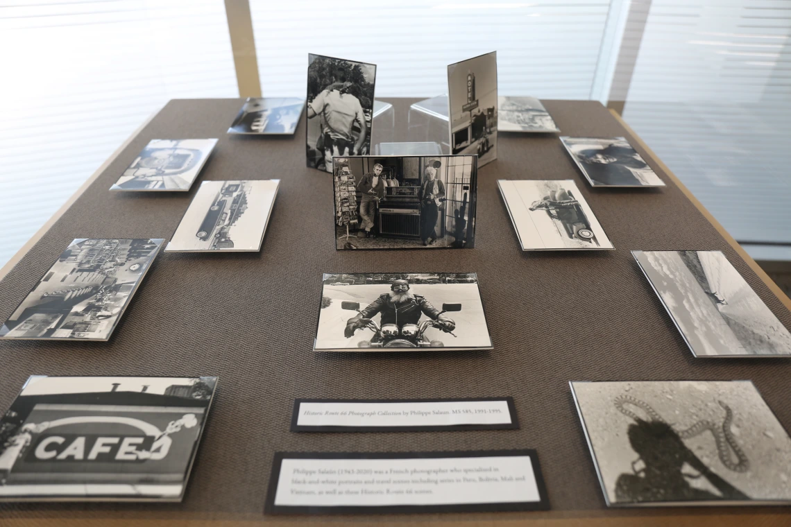 black and white photos in a display case