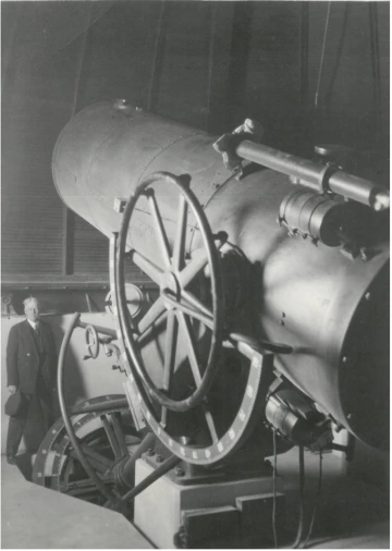 A.E. Douglass standing at the Steward Observatory