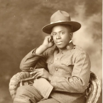 Black soldier looking at camera