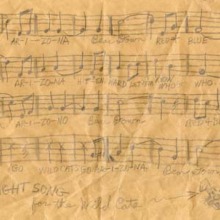 Music and lyrics of the "Bear Down, Arizona" fight song handwritten on a light brown paper bag 
