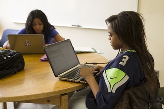 Photo of students in small group study room