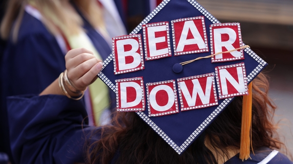University of Arizona graduate with "Bear Down" on her cap