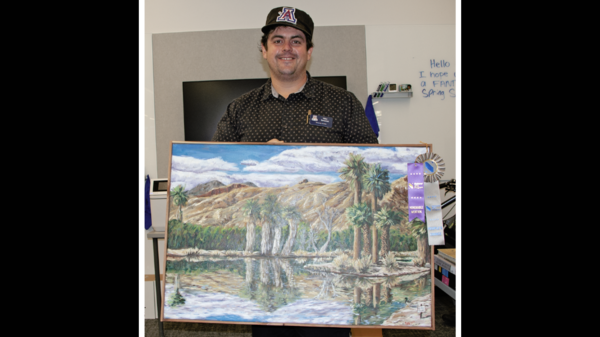 Niko Sanchez with his prize winning painting