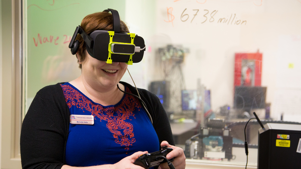 Woman wearing Oculus Rift headset