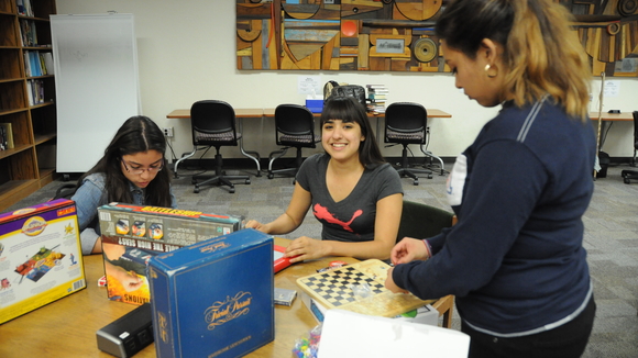 Students with board games at Finals Study Break