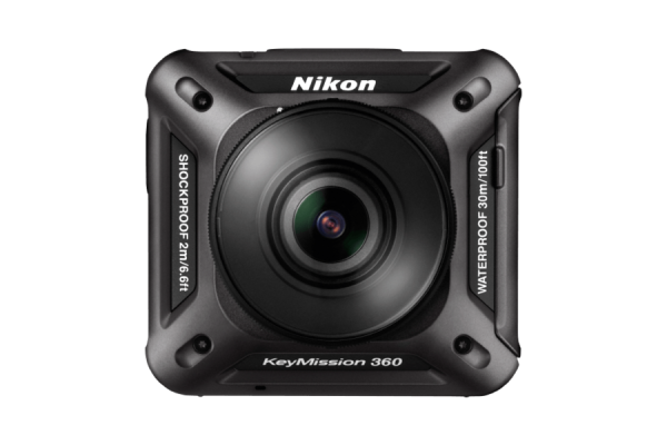 Round camera lens on a square black device with "Nikon" branding in white letters.