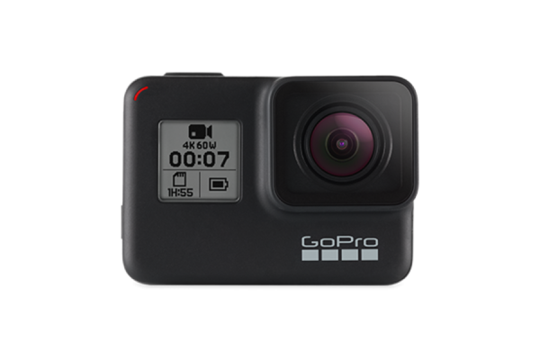 A black, small GoPro camera showing an LCD screen and a lens.