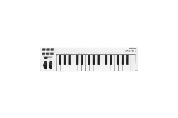 A white midi keyboard with piano keys with two and a half octaves, knobs, and buttons to operate.