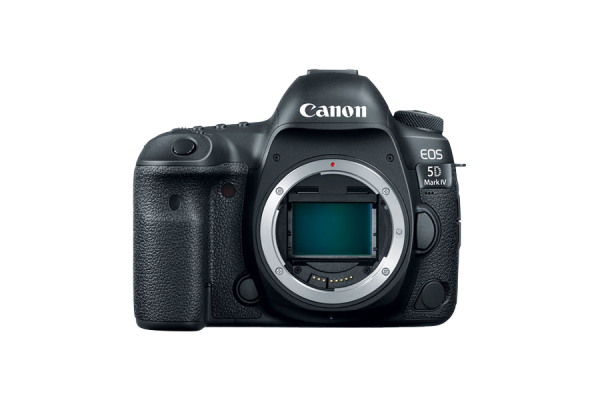 A black Canon 5D mark four DSLR camera without a lens mounted, showing its image sensor.